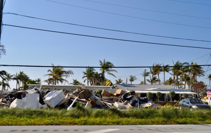 Dell'Armi Law-Hurricane Ian- Property Damage-piles-of-damaged-property-along-the-side-of-the-road